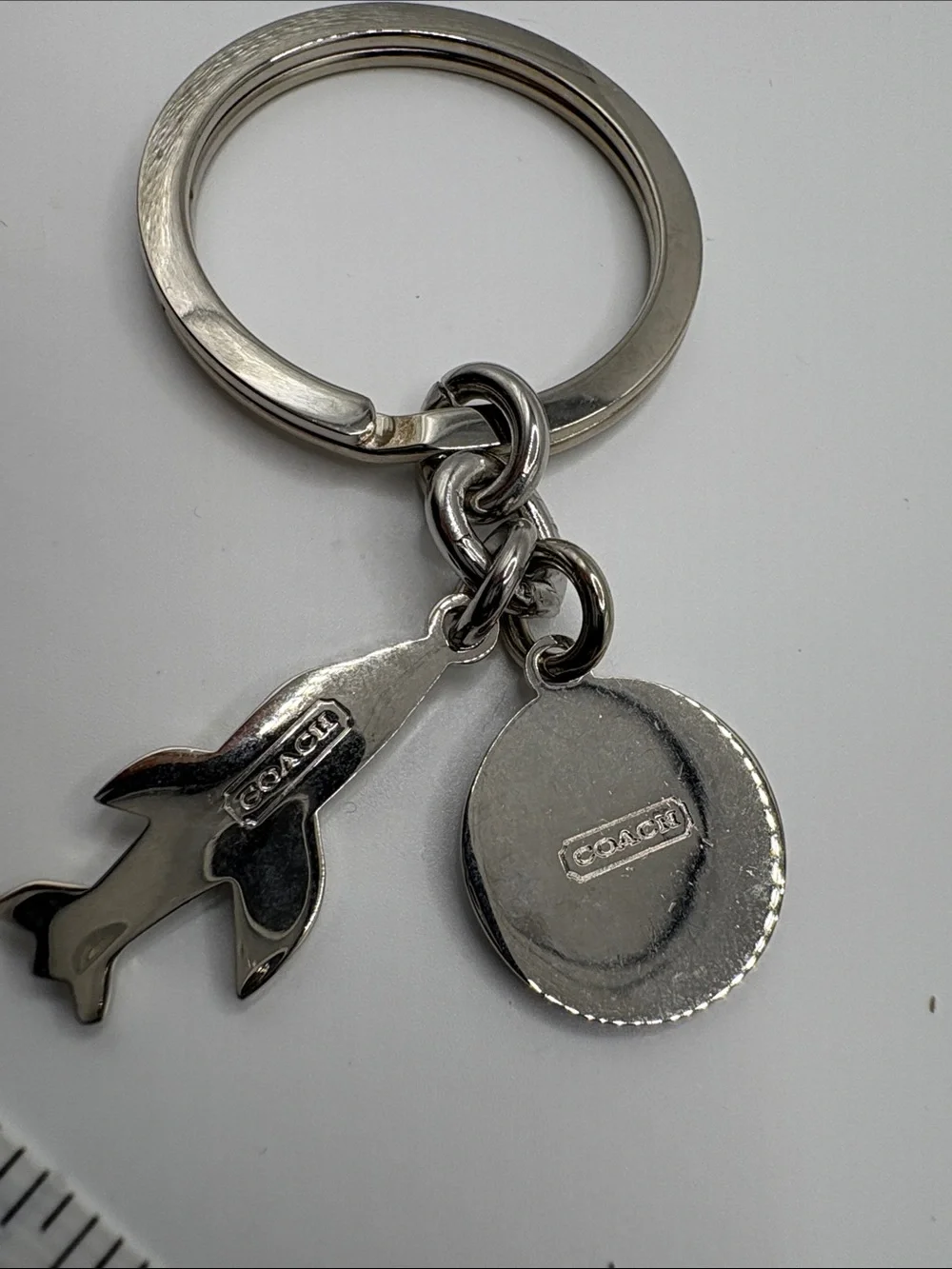 Coach Silver Airplane Keychain with Navy Enamel Glob Charm